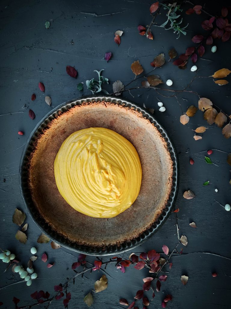pumpkin tart with salted caramel and cardamom whipped cream