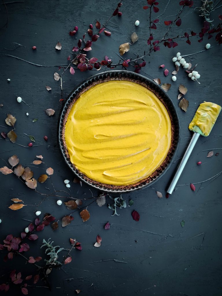 pumpkin tart with salted caramel and cardamom whipped cream